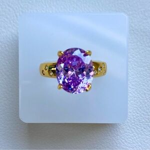 Elegant Gold and Purple Gemstone Ring